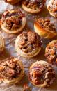 <p>Enjoy the blend of sweet and salty in this pecan pie tart. Everything from the flaky pie crust shell to the slightly salty filling will have you eating way more than one.</p><p><strong>Get the recipe at <a rel="nofollow noopener" href="http://sallysbakingaddiction.com/2013/11/10/salted-pecan-pie-tarts/" target="_blank" data-ylk="slk:Sally's Baking Addiction;elm:context_link;itc:0;sec:content-canvas" class="link ">Sally's Baking Addiction</a>.</strong></p>