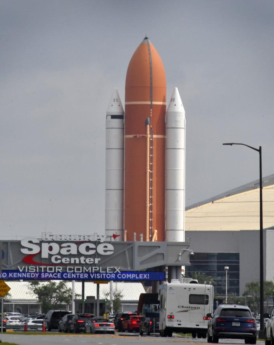 Visitors drive into the entrance of the Kennedy Space Center Visitor Complex, Brevard County's most popular paid tourist attraction.