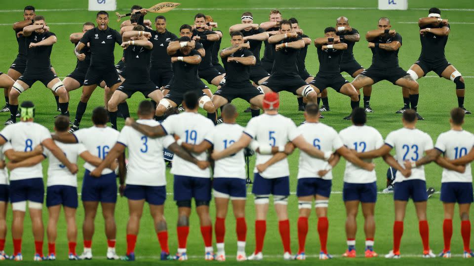 New Zealand players perform the Haka in front of the France players before their match at the Rugby World Cup. - Christian Hartmann/Reuters