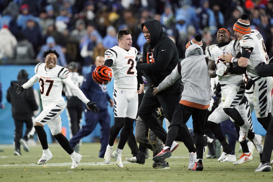 Cincinnati Bengals kicker Evan McPherson (2) celebrates his game-winning field goal against the Tennessee Titans after an NFL divisional round playoff football game, Saturday, Jan. 22, 2022, in Nashville, Tenn. The Cincinnati Bengals won 19-16.(AP Photo/Mark Humphrey)