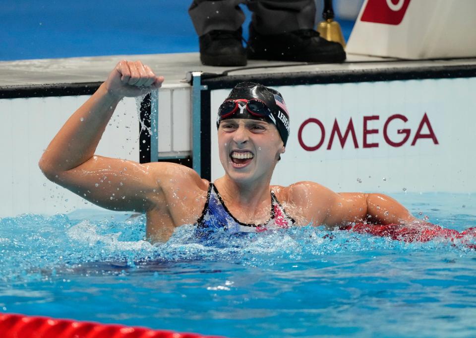 Katie Ledecky celebrates after winning the women's 1,500-meter freestyle final during the Tokyo Olympics.