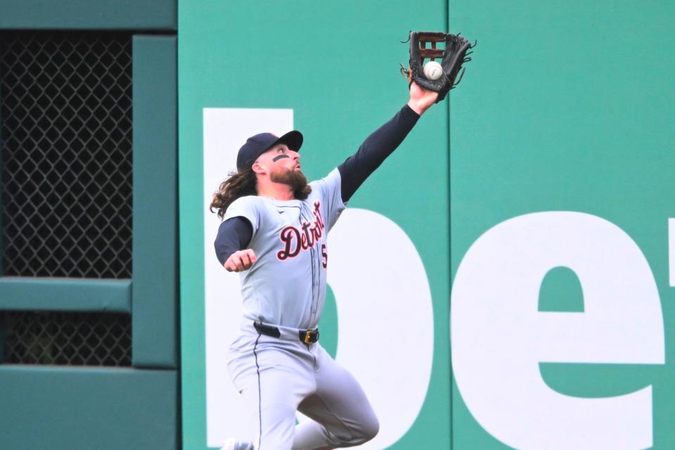 Detroit Tigers right fielder Ryan Vilade (50) makes a catch near the wall in the first inning against the Cleveland Guardians at Progressive Field in Cleveland on Tuesday, May 7, 2024.