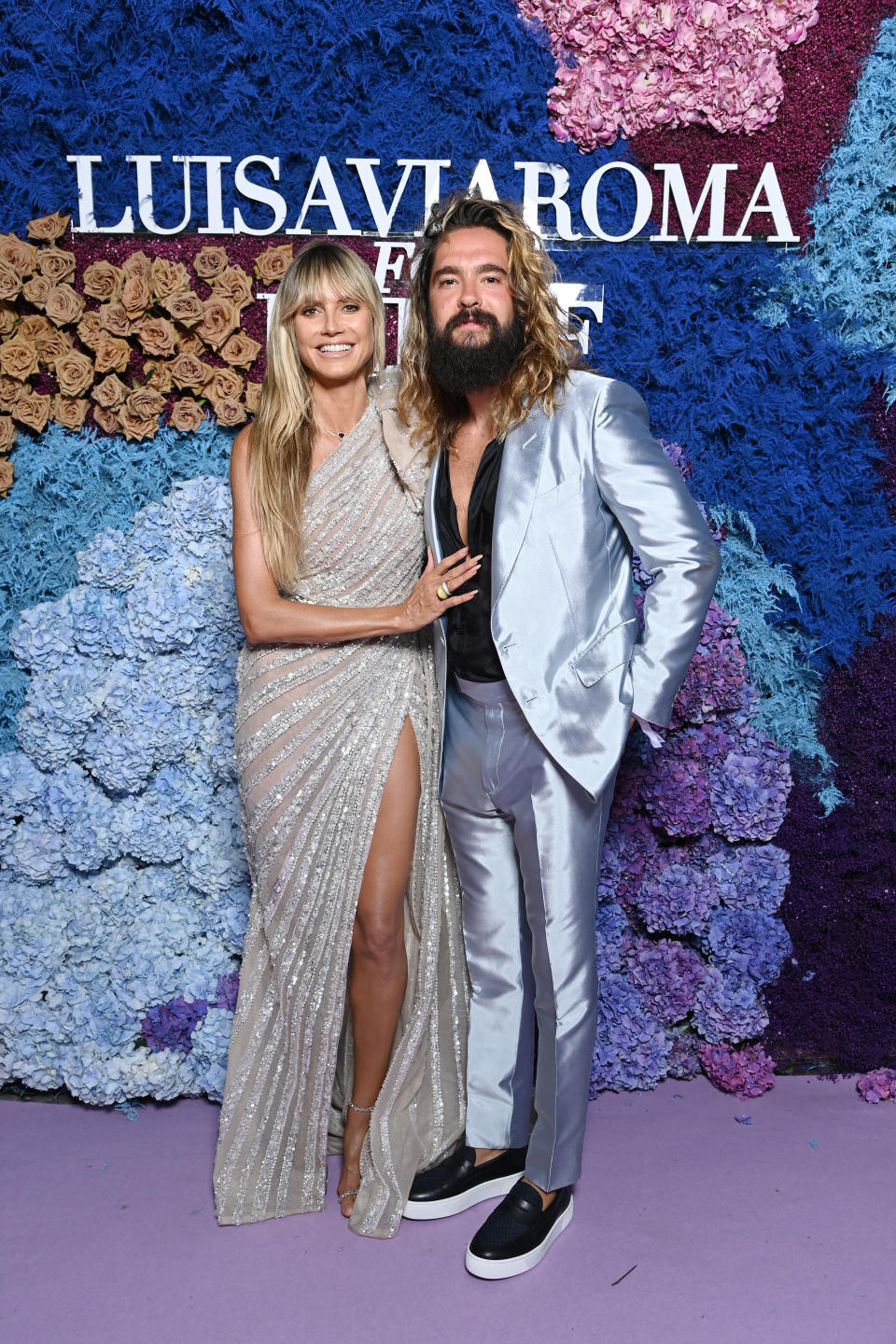 Heidi Klum and Tom Kaulitz attend the LuisaViaRoma for Unicef gala at La Certosa di San Giacomo on July 31, 2021 in Capri, Italy. - Credit: Courtesy of LuisaViaRoma