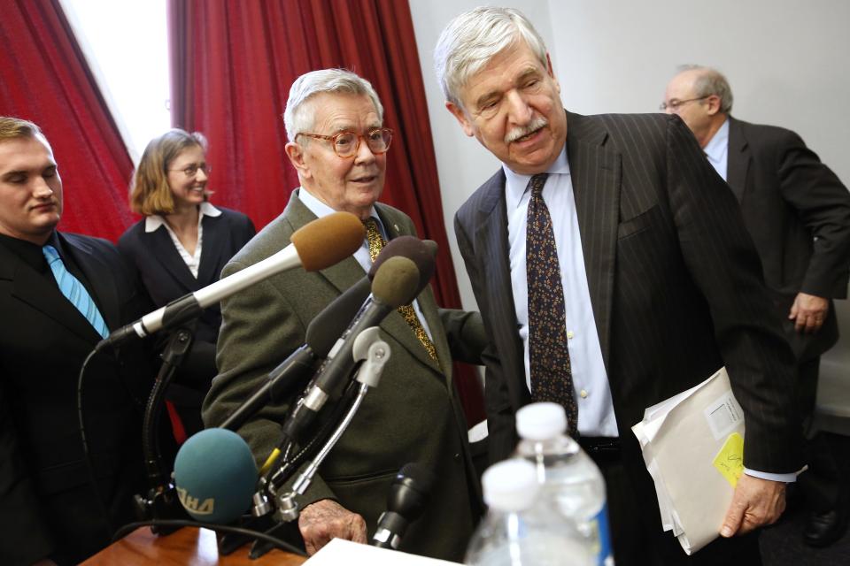 Ambassador Bruce Laingen (3rd L), who was the senior U.S. diplomat in Tehran when he and 51 others were taken prisoner in the Iranian hostage crisis in 1979, and Ambassador John Limbert (R), who served as the Deputy Assistant Secretary of State for Iran during the first Obama administration, wrap up a news conference calling for greater diplomacy between the U.S. and Iran, on Capitol Hill in Washington, in this file photo from February 25, 2013. Laingen argued for years afterward for opening dialogue with Iran and backs the talks that led to a breakthrough agreement over Tehran's nuclear program in Geneva November 24, 2013. But as hostility between the United States and Iran eases, Laingen and fellow ex-hostages want the Islamic Republic at least to acknowledge the trauma of their captivity. REUTERS/Jonathan Ernst (UNITED STATES - Tags: POLITICS)