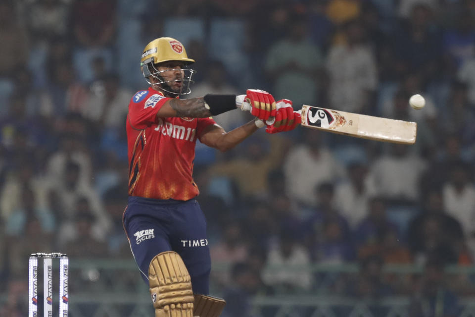 Punjab Kings' captain Shikhar Dhawan plays a shot during the Indian Premier League cricket match between Lucknow Super Giants and Punjab Kings in Lucknow, India, Saturday, March 30, 2024.(AP Photo/Pankaj Nangia)