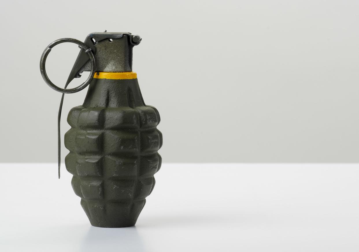 US pineapple style grenade on white - Stock Photo