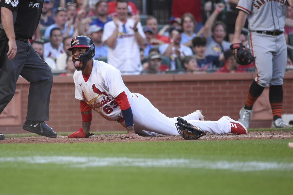 St. Louis Cardinals' Edmundo Sosa (63) reacts after scoring a run during the fourth inning of a baseball game against the San Francisco Giants on Sunday, May 15, 2022, in St. Louis. (AP Photo/Joe Puetz)