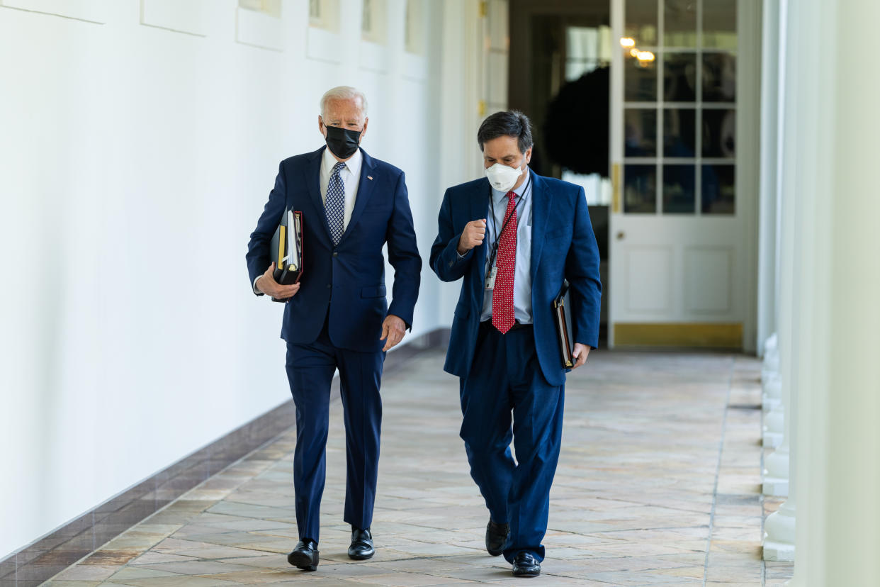 President Biden walks with White House chief of staff Ron Klain 