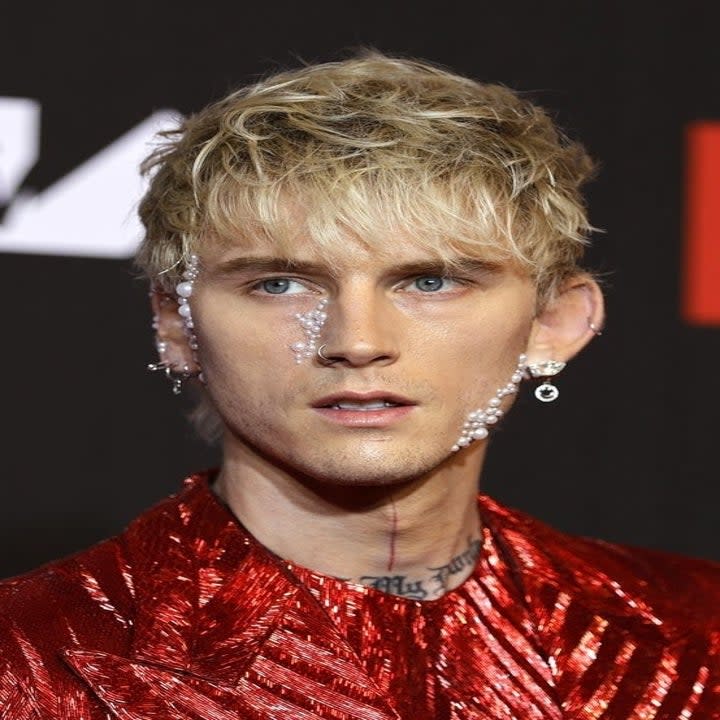 Machine Gun Kelly at a red carpet event