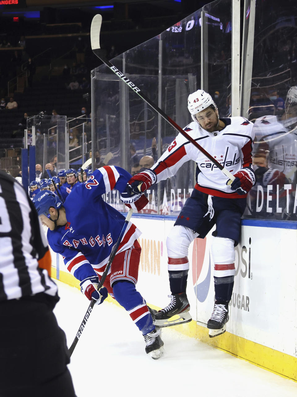 New York Rangers' Adam Fox (23) backs into Washington Capitals' Tom Wilson (43) during the first period of an NHL hockey game Wednesday, May 5, 2021, in New York. (Bruce Bennett/Pool Photo via AP)