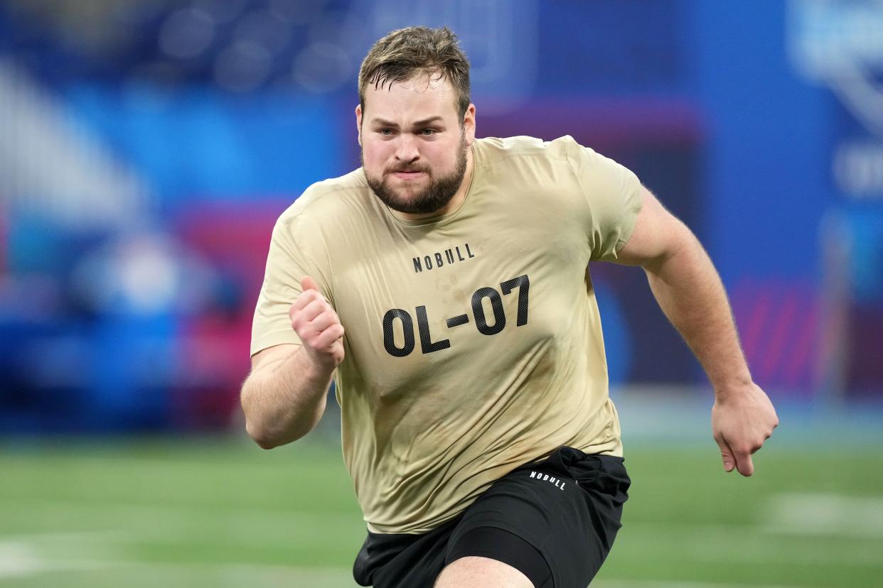 Kansas State offensive lineman Cooper Beebe (OL-07) runs during the 2024 NFL Combine on March 3 at Lucas Oil Stadium in Indianapolis.