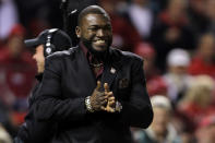 ST LOUIS, MO - OCTOBER 20: David Ortiz of the Boston Red Sox smiles on the field after receiving the 2011 Roberto Clemente Award presented by Chevrolet before Game Two of the MLB World Series between the Texas Rangers and the St. Louis Cardinals at Busch Stadium on October 20, 2011 in St Louis, Missouri. (Photo by Ezra Shaw/Getty Images)