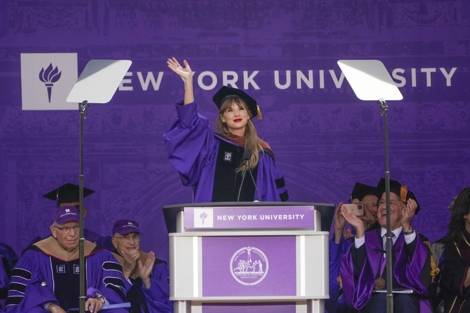 Taylor Swift waves after speaking during a graduation ceremony for New York University at Yankee Stadium in New York, Wednesday, May 18, 2022. (AP Photo/Seth Wenig) - Credit: AP