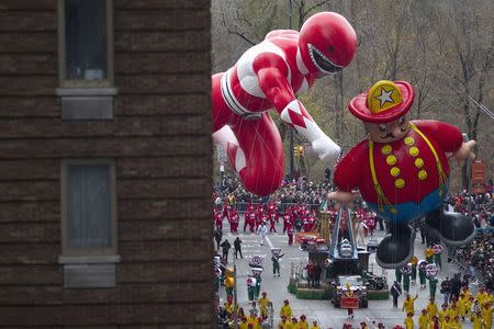 Floats make their way down 6th Ave during the Macy's Thanksgiving Day Parade in New York November 27, 2014. REUTERS/Carlo Allegri