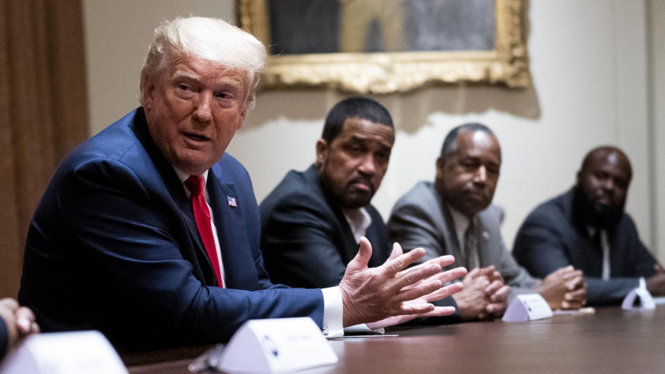 U.S. President Donald Trump, center, speaks during a meeting with African-American supporters in the Cabinet Room of the White House in Washington, D.C., U.S., on Wednesday, June 10, 2020. (Doug Mills/The New York Times/Bloomberg via Getty Images)