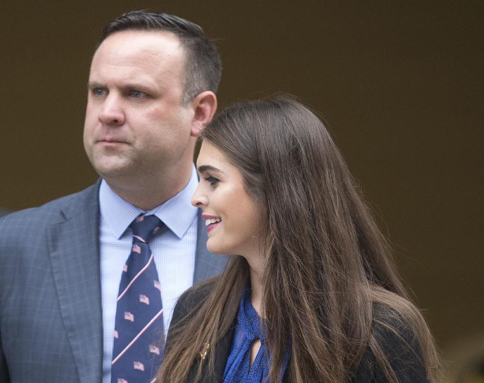 FILE - In this May 12, 2016 file photo, Republican presidential candidate Donald Trump's campaign communications manager Hope Hicks, right, and Daniel Scavino Jr., Director for Social Media for Trump Campaign walk to their motorcade vehicle after Trump's visit to Jones Day's D.C. law offices in Washington. President-elect Donald Trump has named his senior communications team, choosing Sean Spicer as press secretary, Jason Miller as communications director, Hope Hicks as director of strategic communications and Daniel Scavino as director of Social Media. (AP Photo/Pablo Martinez Monsivais)