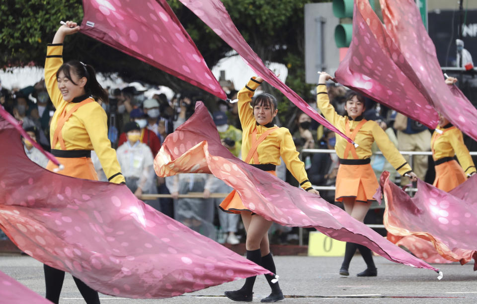 Students of Kyoto Tachibana S.H.S. Band perform during National Day celebrations in front of the Presidential Building in Taipei, Taiwan, Monday, Oct. 10, 2022. (AP Photo/Chiang Ying-ying)