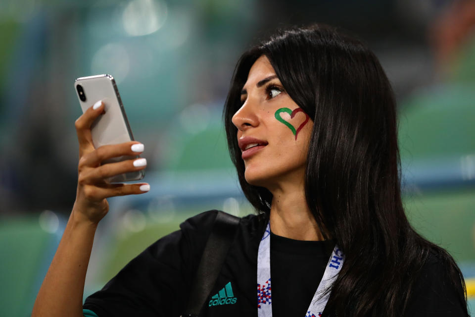 <p>A fan enjoys the atmosphere before the 2018 FIFA World Cup Russia group B match between Portugal and Spain at Fisht Stadium on June 15, 2018 in Sochi, Russia. (Photo by Chris Brunskill/Fantasista/Getty Images) </p>