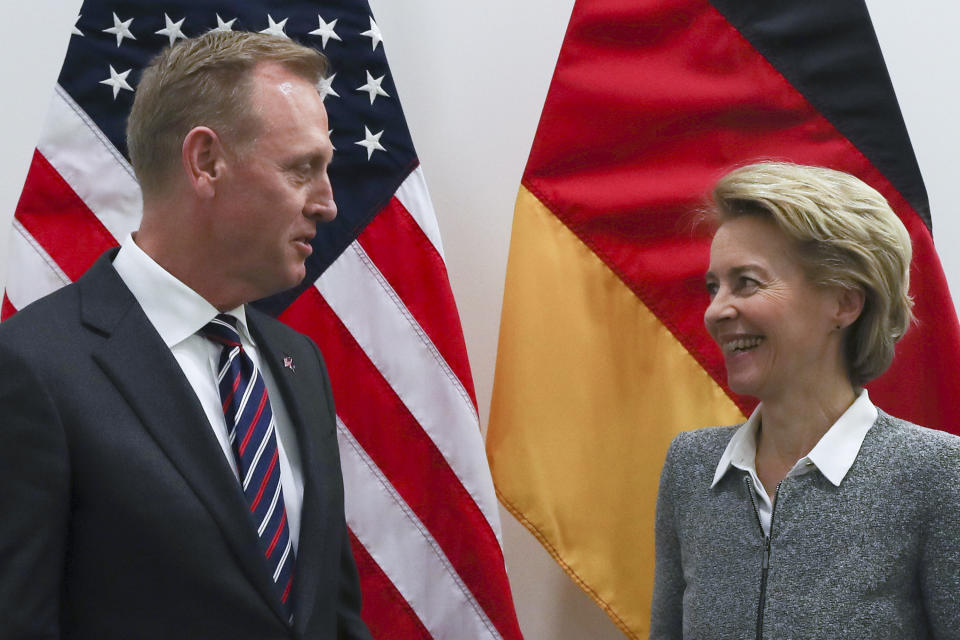 Acting US Defence Secretary Patrick Shanahan, left, talks to German's Defence Minister Ursula Von Der Leyen during a bilateral meeting at the second day of a NATO defense ministers meeting at NATO headquarters in Brussels, Thursday, Feb. 14, 2019. NATO defense ministers are discussing the future of the alliance's operation in Afghanistan and how best to use its military presence to support political talks aimed at ending the conflict. (AP Photo/Francisco Seco)