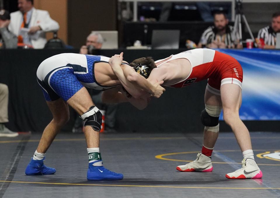 Hackley's Cole Joseph and Tioga's Caden Bellis wrestle in a 138-pound semifinal match at the NYSPHSAA Wrestling Championships at MVP Arena in Albany, on Saturday, February 25, 2023.