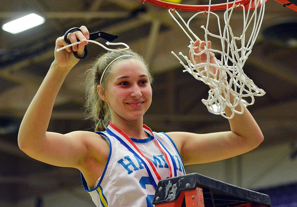 Hamlin's Marissa Bawdon takes her turn at cutting down the nets after the Chargers defeated Wagner in the championship game of the state Class A girls basketball tournament on Saturday, March 11, 2023 in the Watertown Civic Arena.