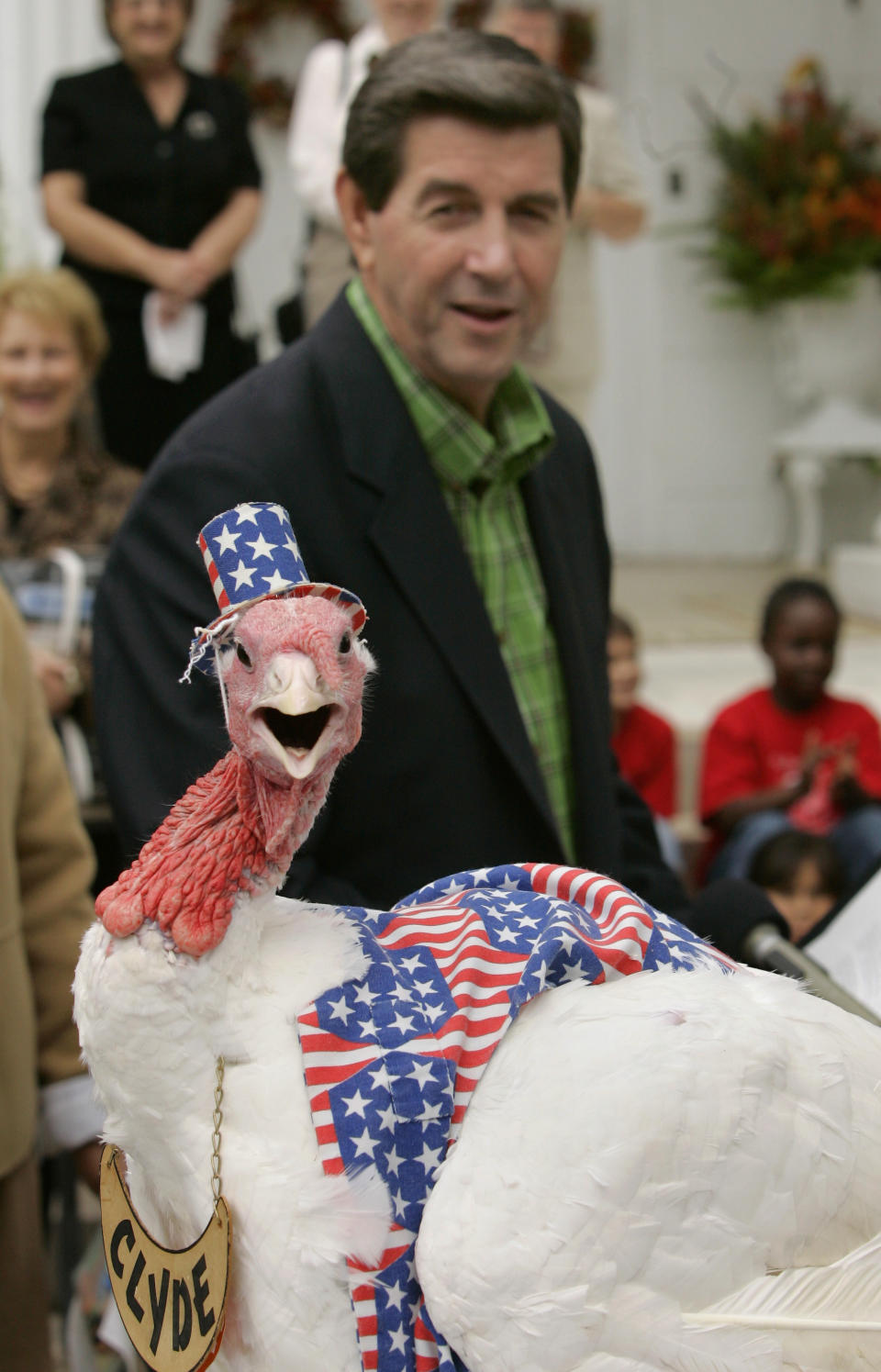 Alabama Gov. Bob Riley pardons the life of a turkey named “Clyde” during a ceremony on the lawn of the Governor’s Mansion, Tuesday, Nov. 15, 2005, in Montgomery, Ala. The annual Thanksgiving tradition is in its 58th year.