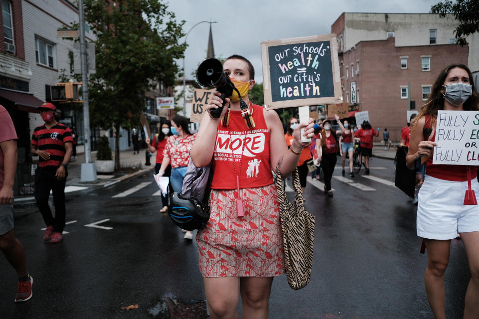 Members of the teachers union, parents and students participate in a march through Brooklyn, N.Y. to demand a safer teaching environment for themselves and for students during the Covid-19 pandemic on Sept. 1, 2020.<span class="copyright">Spencer Platt—Getty Images</span>