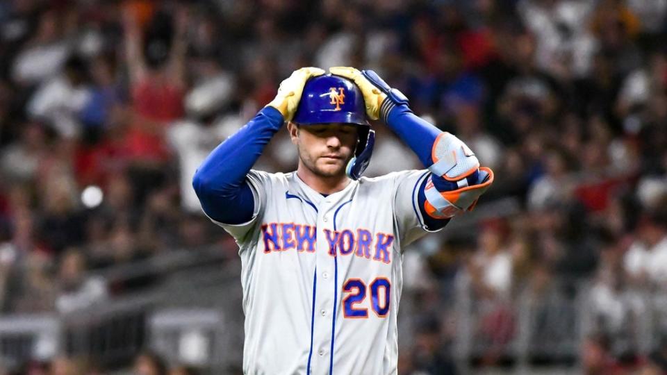Oct 2, 2022; Cumberland, Georgia, USA; New York Mets first baseman Pete Alonso (20) reacts after hitting a pop fly against the Atlanta Braves in the seventh inning at Truist Park.