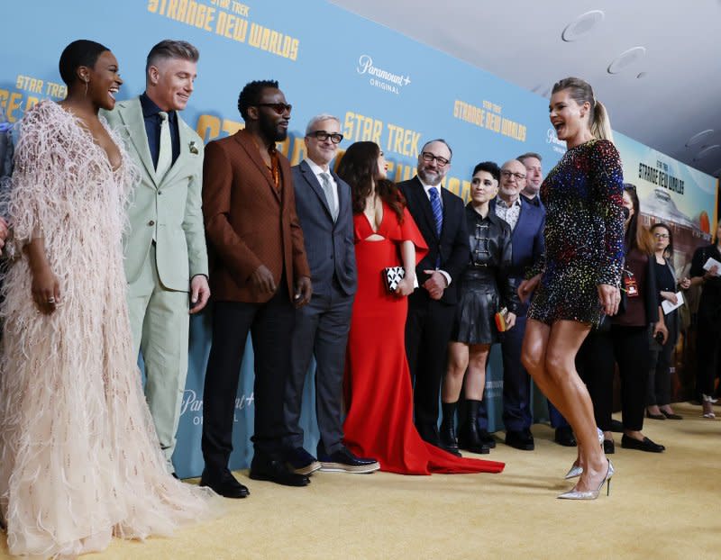 Rebecca Romijn hustles in for a group shot on the red carpet at the New York premiere of "Star Trek: Strange New Worlds" at AMC Lincoln Square Theater in 2022. File Photo by John Angelillo/UPI