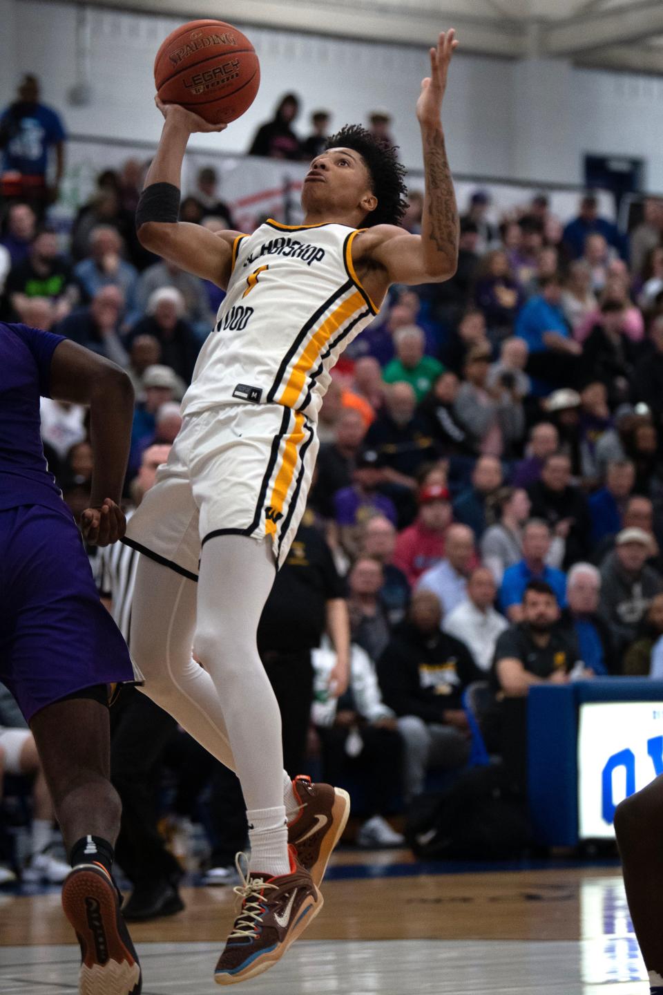 Archbishop Wood junior Jalil Bethea goes up for a shot during Tuesday's 66-56 loss to Roman Catholic.