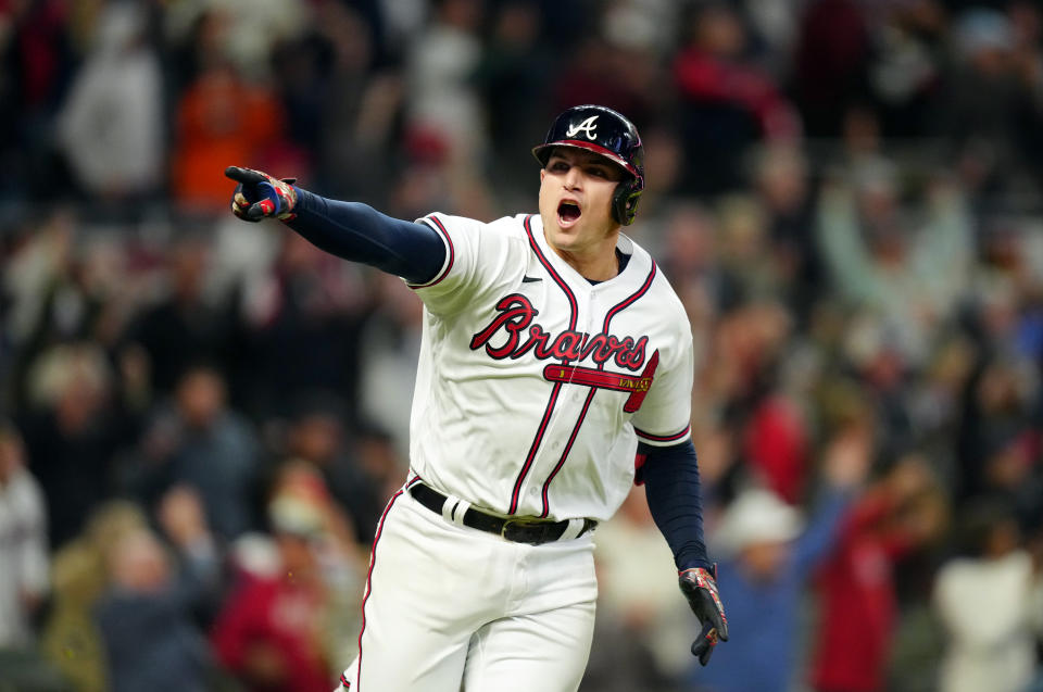 ATLANTA, GA - OCTOBER 16: Austin Riley #27 of the Atlanta Braves reacts after hitting a walk-off single to defeat the Dodgers in Game 1 of the NLCS between the Los Angeles Dodgers and the Atlanta Braves at Truist Park on Saturday, October 16, 2021 in Atlanta, Georgia. (Photo by Daniel Shirey/MLB Photos via Getty Images)