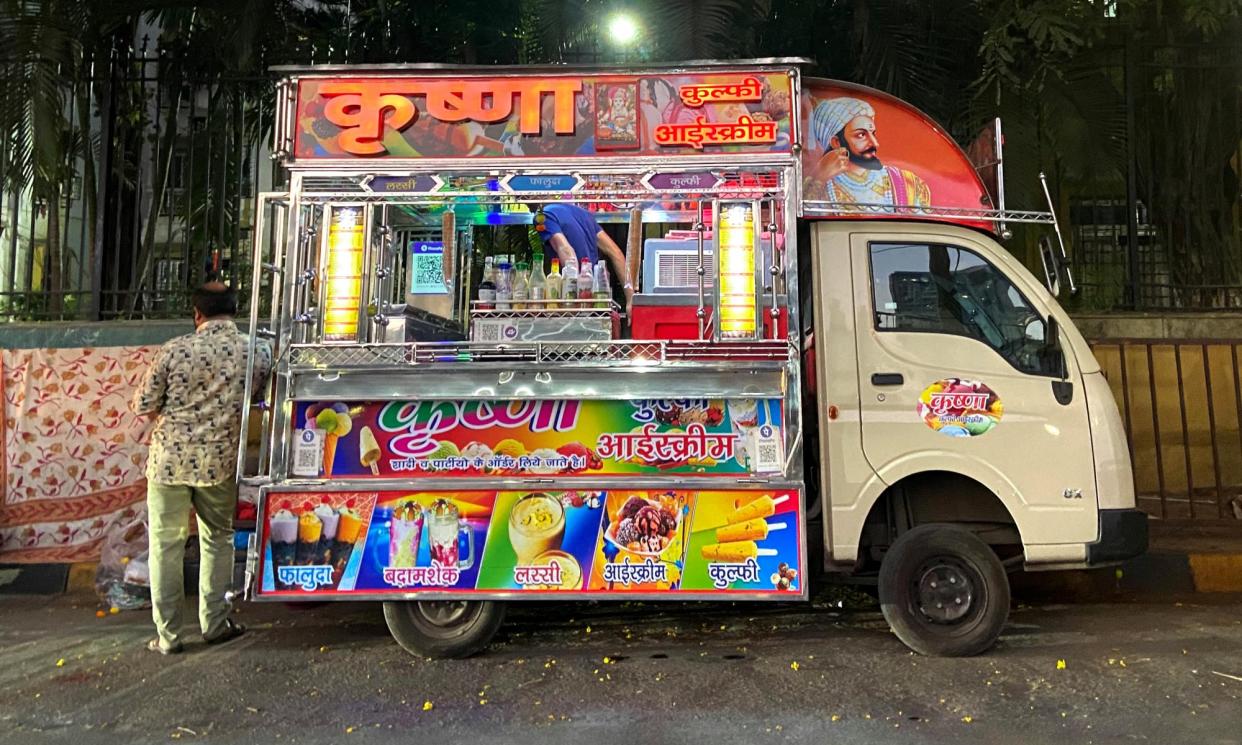 <span>An ice-cream truck open for business in Mumbai. The ‘snack culture’ in richer states such as Gujarat and Maharashtra draws many farmers-turned-vendors from regions hard hit by the climate crisis. The money they earn in a few months will sustain them for the rest of the year. </span><span>Photograph: Roli Srivastava/Migration Story</span>