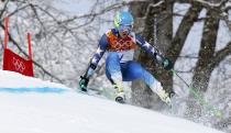 Ted Ligety of the U.S. skis during the first run of the men's alpine skiing giant slalom event at the 2014 Sochi Winter Olympics at the Rosa Khutor Alpine Center February 19, 2014. REUTERS/Stefano Rellandini (RUSSIA - Tags: SPORT SKIING OLYMPICS)