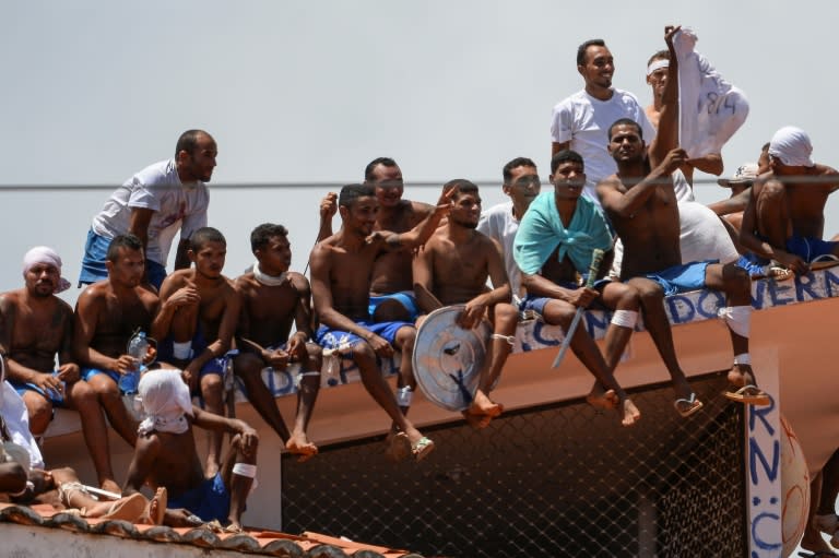 Inmates occupy the roof of Alcacuz jail near the city of Natal in northeastern Brazil on January 16, 2017