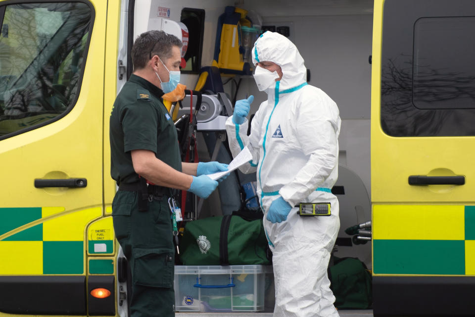 NHS staff outside an entrance to Southend University hospital in Essex. 