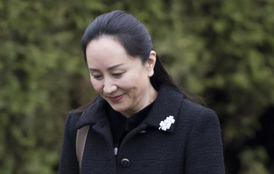 Meng Wanzhou, chief financial officer of Huawei, leaves her home in Vancouver, Monday, January, 20, 2020. A court hearing begins today in Vancouver over the American request to extradite an executive of the Chinese telecom giant Huawei on fraud charges. THE CANADIAN PRESS/Jonathan Hayward/The Canadian Press via AP)