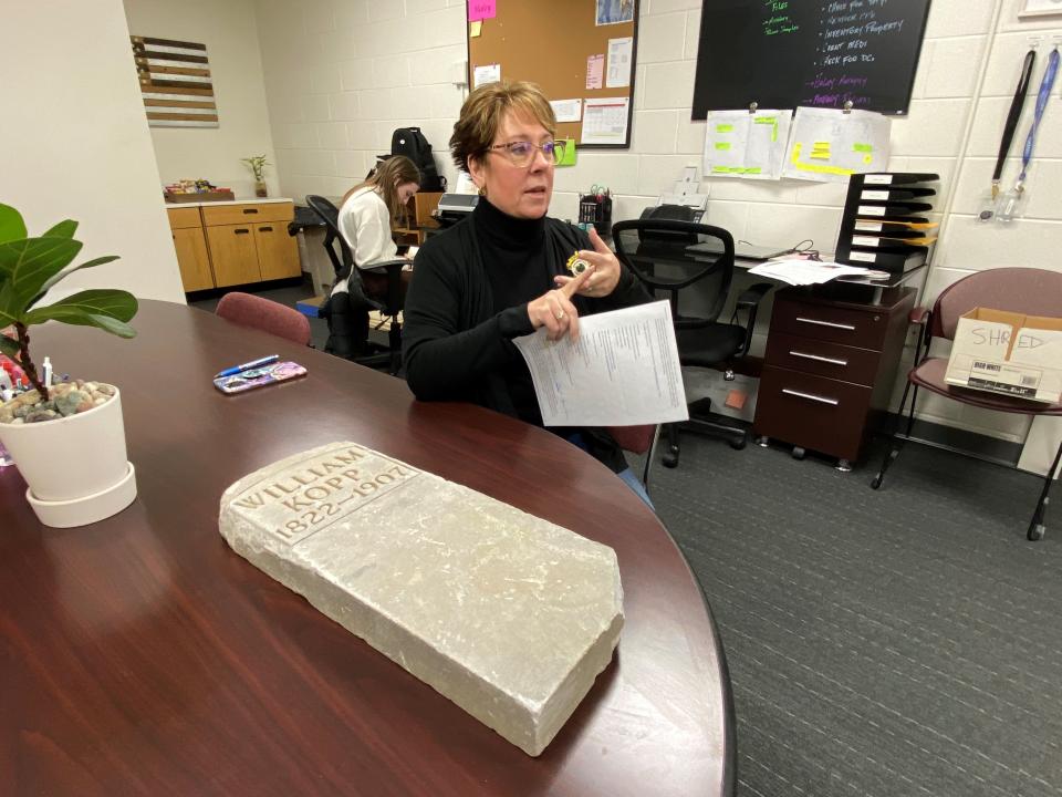 Tippecanoe County Coroner Carrie Costello discusses how William Kopp's tombstone came to be stored at the coroner's office for 26 years. Through a team effort of the coroner's office, the Tippecanoe County Historical Association and the Fountain County Historical Society, the William Kopp's tombstone will soon be reset over his grave in Attica.