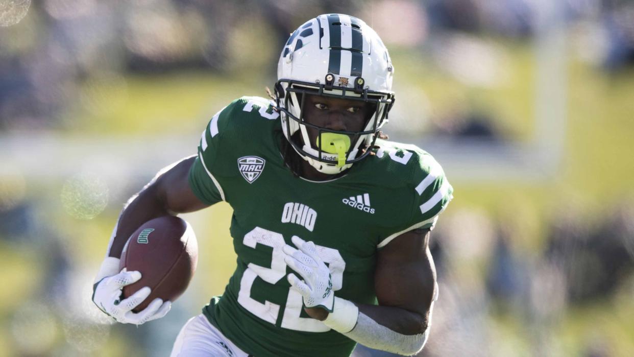 Ohio Bobcats running back Sieh Bangura (22) runs against the Akron Zips on Saturday, Oct. 8, 2022 in Athens, Ohio. (AP Photo/Emilee Chinn)