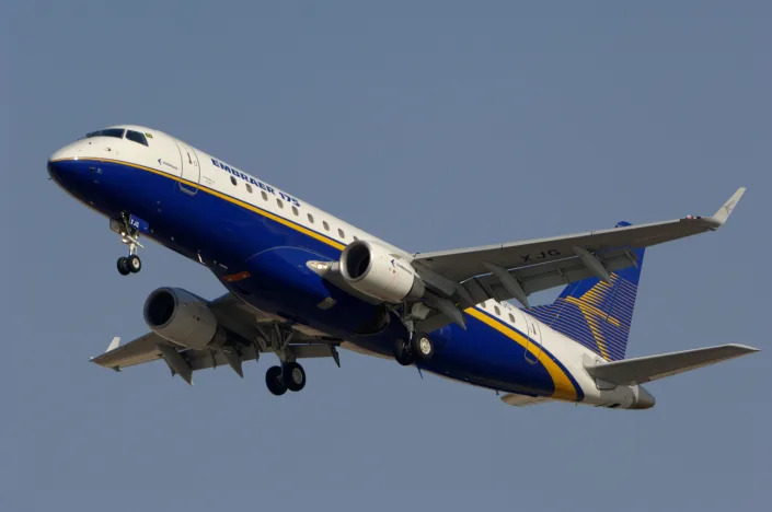 Prototype aircraft, an Embraer 175 in a flypast with undercarriage down.