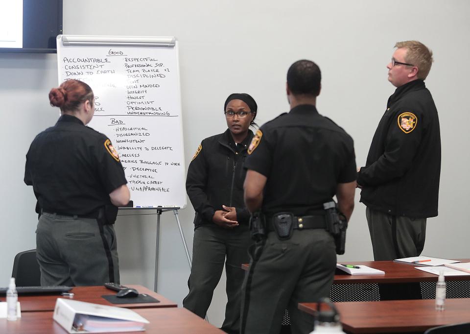 A group of corrections officer academy cadets participate in a verbal de-escalation drill Wednesday at the Stark County Law Enforcement Training Center in Massillon. The course kicked off Monday and is the first academy hosted by the new training facility.