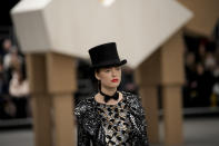 A model wears a creation as part of the Chanel Haute Couture Spring-Summer 2023 collection presented in Paris, Tuesday, Jan. 24, 2023. (AP Photo/Christophe Ena)