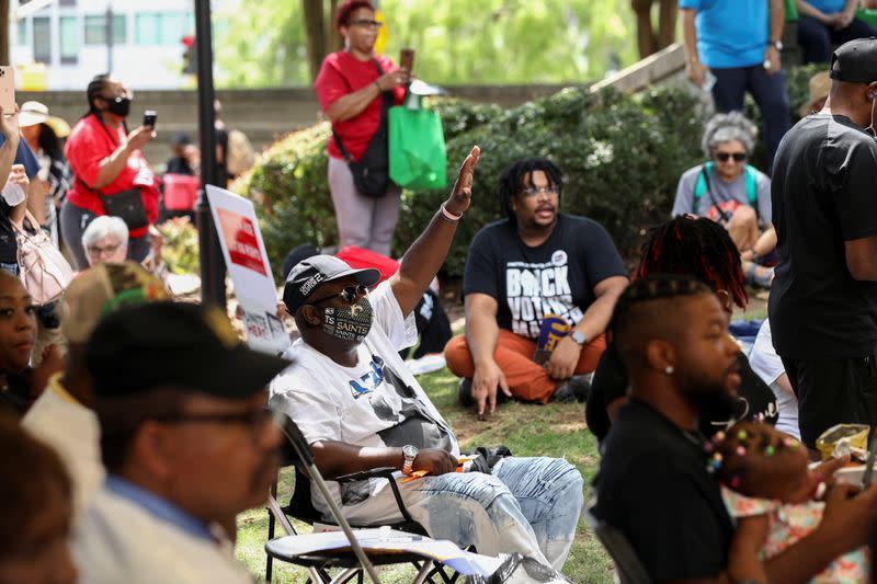 People gather at Ebenezer Baptist Church during a stop on the Freedom Ride For Voting Rights in Atlanta