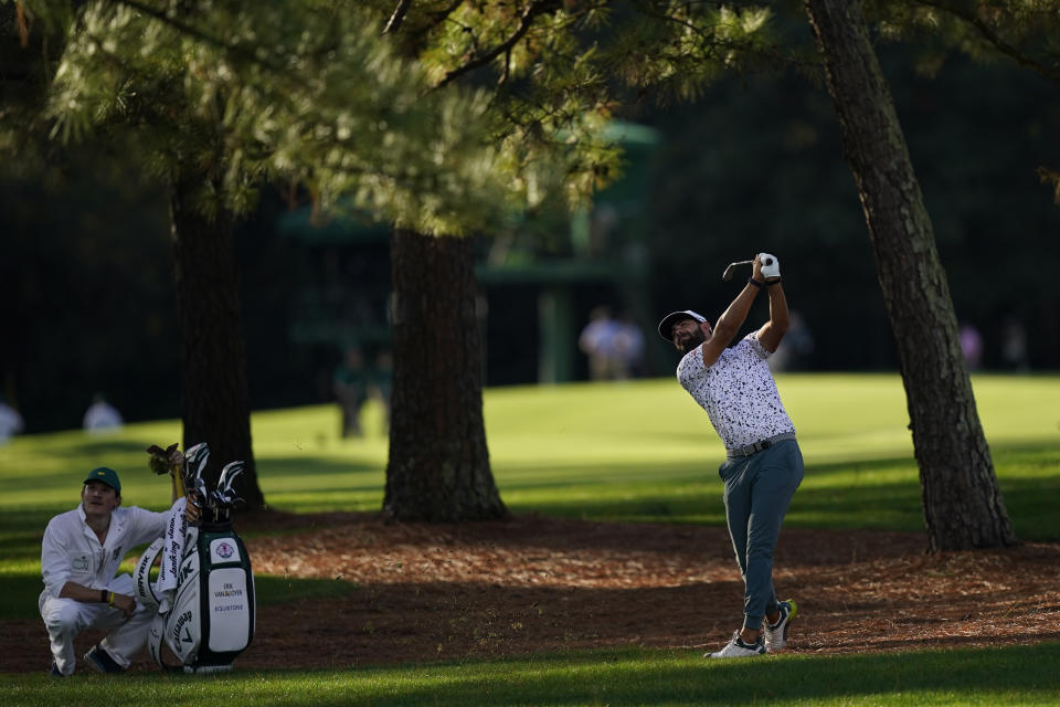 Erik van Rooyen, of South Africa, hits out of the rough on the seventh hole during the first round of the Masters golf tournament Thursday, Nov. 12, 2020, in Augusta, Ga. (AP Photo/David J. Phillip)