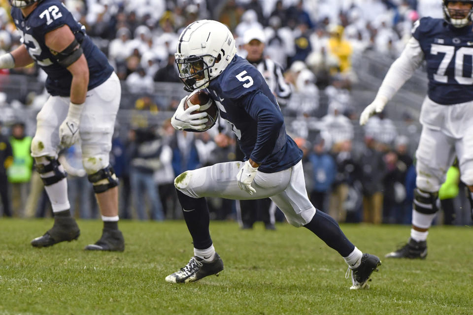 Penn State wide receiver Jahan Dotson (5) runs following a catch against Penn State during an NCAA college football game in State College, Pa., Nov. 13, 2021. Dotson was selected by the Washington Commanders during the first round of the NFL draft Thursday, April 28. (AP Photo/Barry Reeger, File)