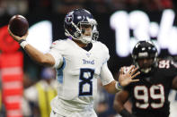 Tennessee Titans quarterback Marcus Mariota (8) works against the Atlanta Falcons during the first half of an NFL football game, Sunday, Sept. 29, 2019, in Atlanta. (AP Photo/John Bazemore)