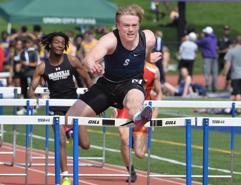 Seneca's Ryan Miller wins the boys 110-meter hurdles during Saturday's Fort LeBoeuf Invitational.