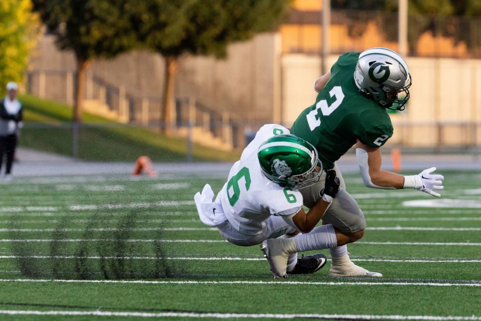 Provo’s Drew Deucher tackles Olympus’s Ty Seagle in the football game at Olympus High School in Holladay on Friday, Aug. 18, 2023. | Megan Nielsen, Deseret News