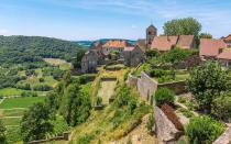 <p>Concealed by Alpine peaks and rolling, wooded hills, Jura—France’s smallest wine region—has long been shielded from the swarms that descend upon Burgundy to the west and Switzerland to the east. But in recent years, the Jura’s highly idiosyncratic, oxidative wines have generated explosive interest, with bottles making regular appearances on sommelier lists at U.S. restaurants like Eleven Madison Park and the French Laundry. Thanks to the newfound attention, the secret of Franche-Comté’s remote gem—a medieval-era region perfect for gourmands and nature-lovers—is out at last. Oenophiles will want to visit buzzy vineyards like <a rel="nofollow noopener" href="http://www.stephane-tissot.com/en/" target="_blank" data-ylk="slk:Domaine André & Mirielle Tissot;elm:context_link;itc:0;sec:content-canvas" class="link ">Domaine André & Mirielle Tissot</a>; co-owner Stéphane Tissot is a dynamic, progressive vintner who produces one of Jura’s famous sherry-like <em>vin jaunes</em>. Pair them with the Jura’s rich, rustic cuisine and the regional specialty, wheels of raw-milk Comté cheese. Burn off the calories hiking, cycling, or skiing the miles of quiet trails that arc around steep mountain ridges, shimmering lakes, and primordial waterfalls. For lodgings, turn to <a rel="nofollow noopener" href="http://jardinsurglantine.natidees.com/" target="_blank" data-ylk="slk:Les Jardins sur Glantine;elm:context_link;itc:0;sec:content-canvas" class="link ">Les Jardins sur Glantine</a>, a charming B&B that also produces superb natural wines. <em>—Christopher Ross</em></p>