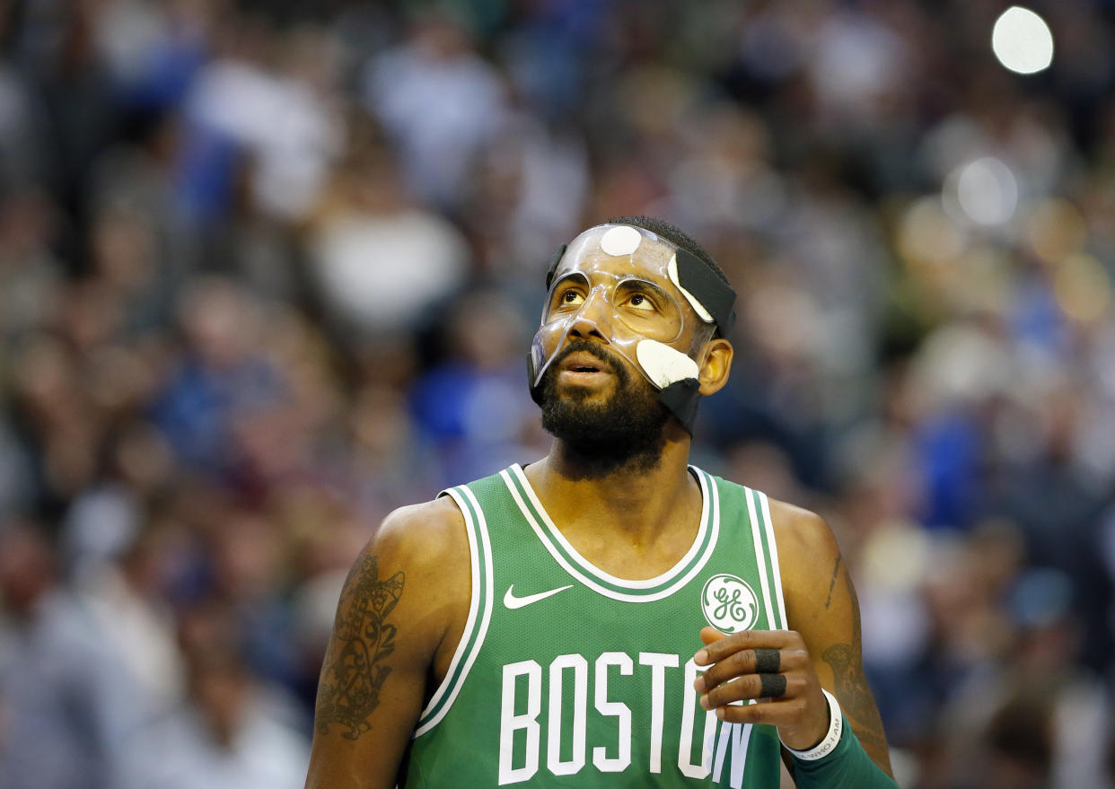 Kyrie Irving looks up at the scoreboard and wonders how he got all those points with so few shots. (AP)