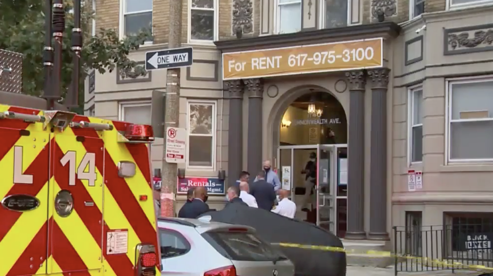 Photo shows the front of a woman's apartment where an elevator crushed and killed her.